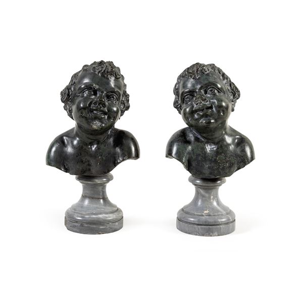 Pair of small marble portrait busts