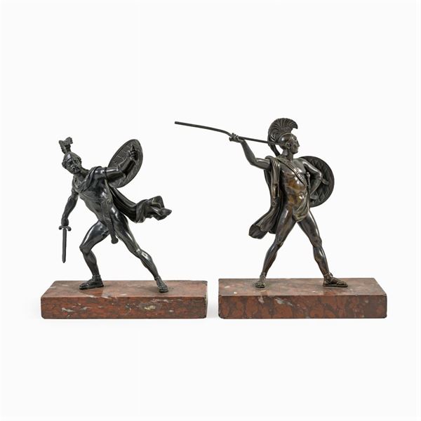 Coppia di sculture in bronzo brunito