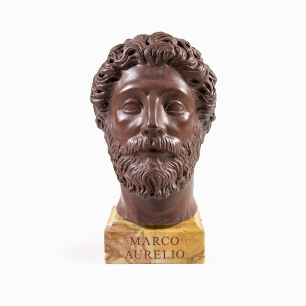 Testa in marmo rosso antico