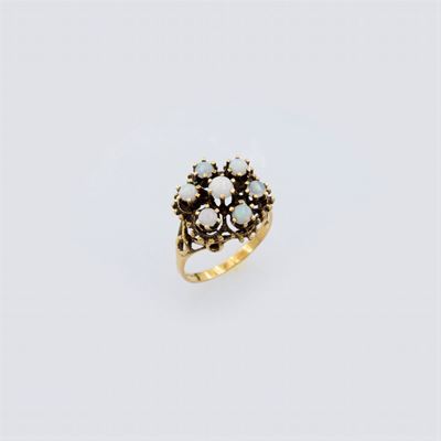 Anello in Oro Giallo 14kt con Sette Opali Arlecchino