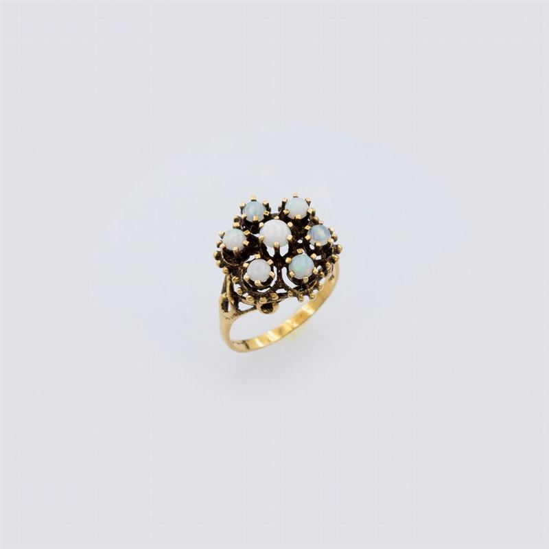 Anello in Oro Giallo 14kt con Sette Opali Arlecchino