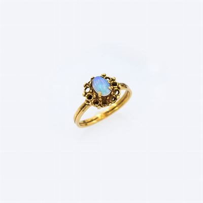Anello in Oro Giallo 14kt con un Opale Arlecchino