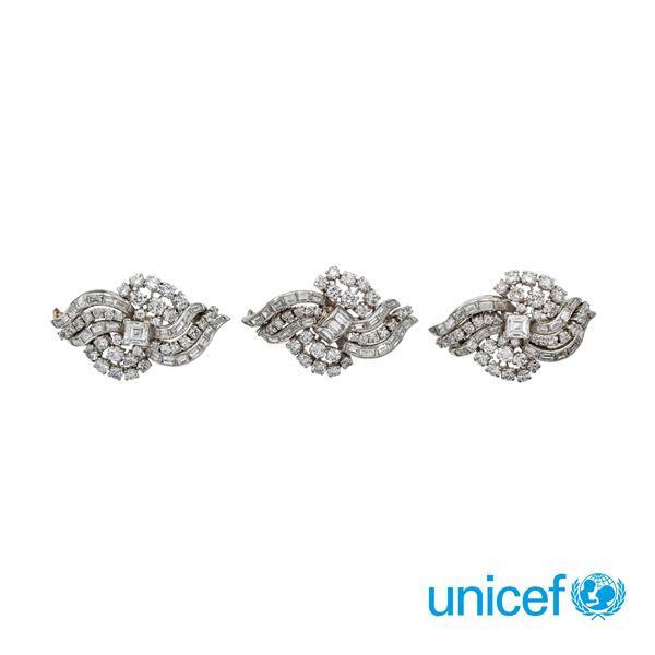Three 18kt white gold and diamonds  brooches