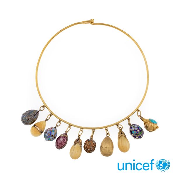 Golino in oro giallo 18kt con ovette pendenti