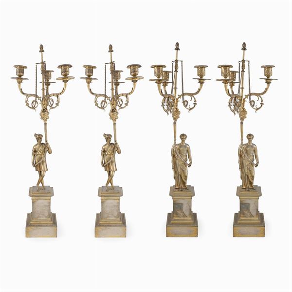 Four three lights silver candlesticks