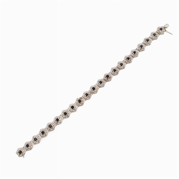 18kt white gold bracelet with round sapphires