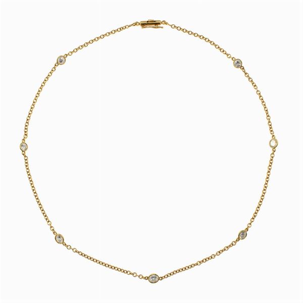 18kt yellow gold necklace with seven diamonds