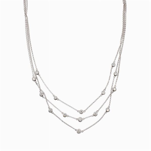 Three-strand necklace in 18kt white gold and diamonds