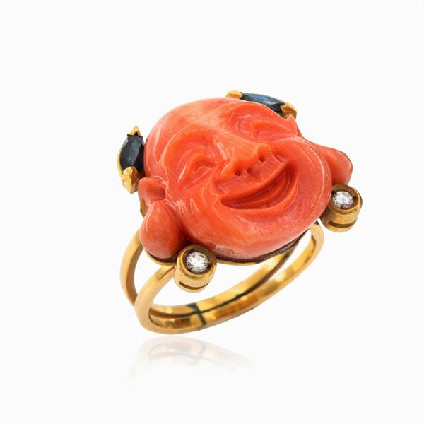 Anello Buddha in oro giallo 18kt e corallo