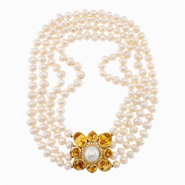 Four strands of scaramazze pearl necklace