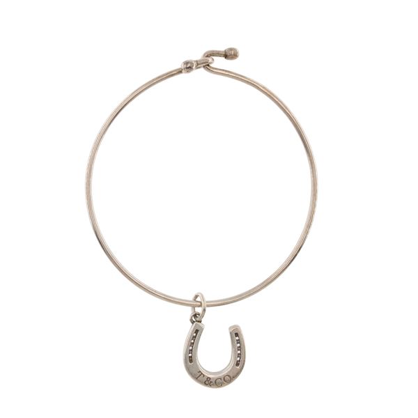 Tiffany & Co. silver bracelet with horseshoe pendant