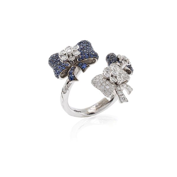 Contrarie ring with bow motif