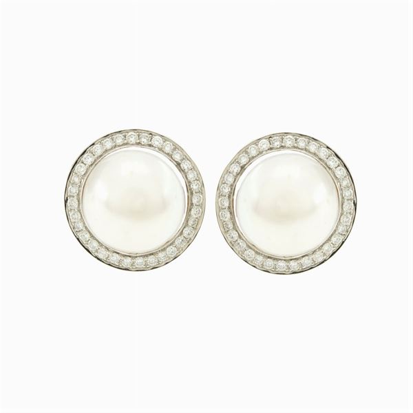 Orecchini a lobo in oro giallo e bianco 18kt