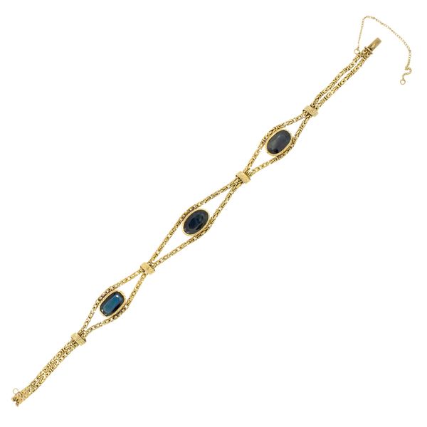 18kt yellow gold bracelet with three sapphires