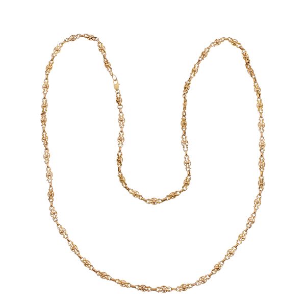 Long golden metal necklace