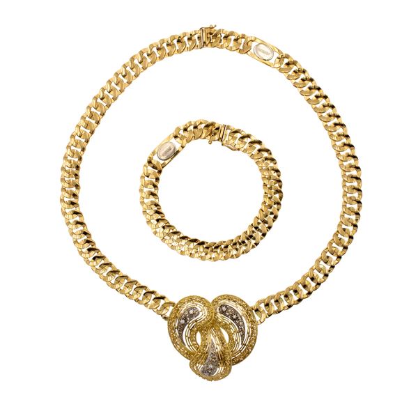 Collana e bracciale in oro giallo 18kt