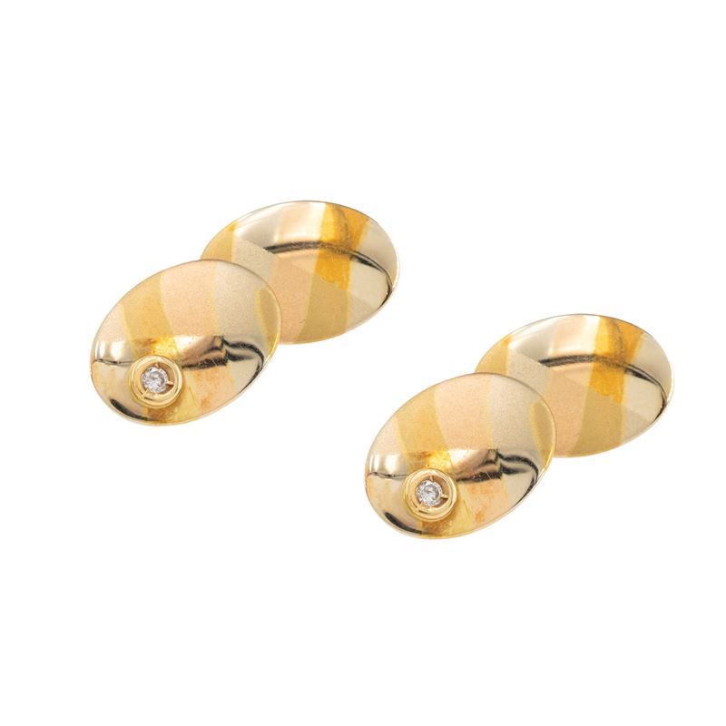 Gemelli ovali in oro a tre colori 18kt, con diamanti brillanti