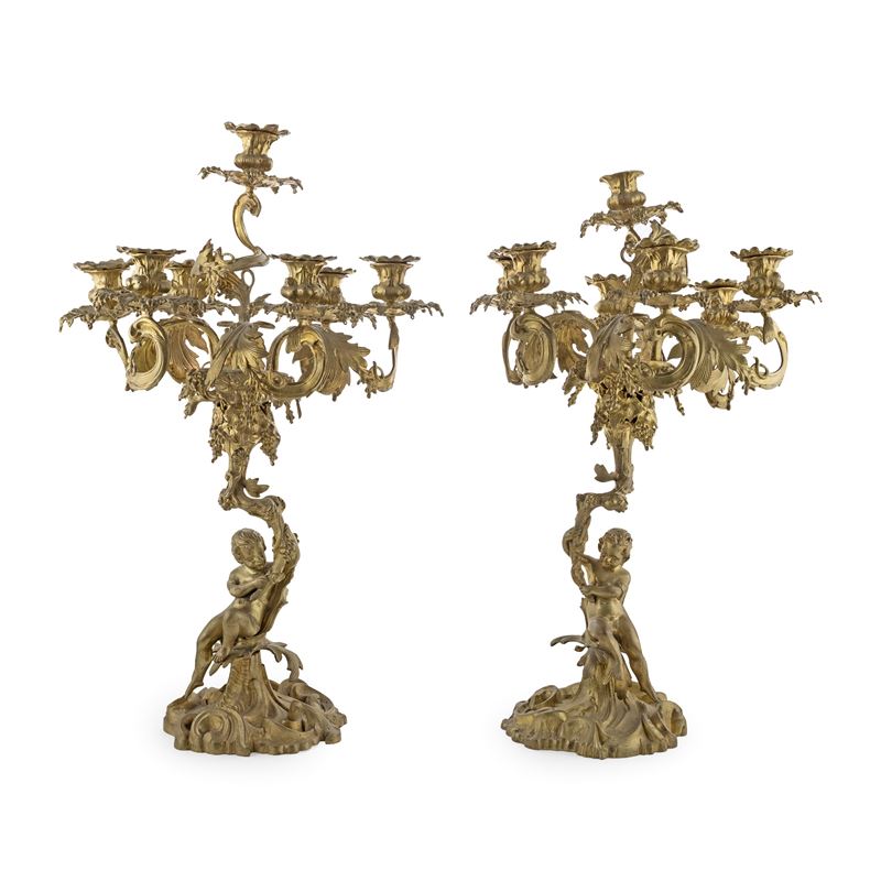 Coppia di Candelabri a Sette Luci in Bronzo Dorato