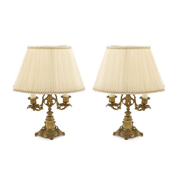 Pair of electrified gilt bronze two-branched candlesticks  (Italy, 20th century)  - Auction Furniture Sculpture and Works of Art - Web Only - Colasanti Casa d'Aste