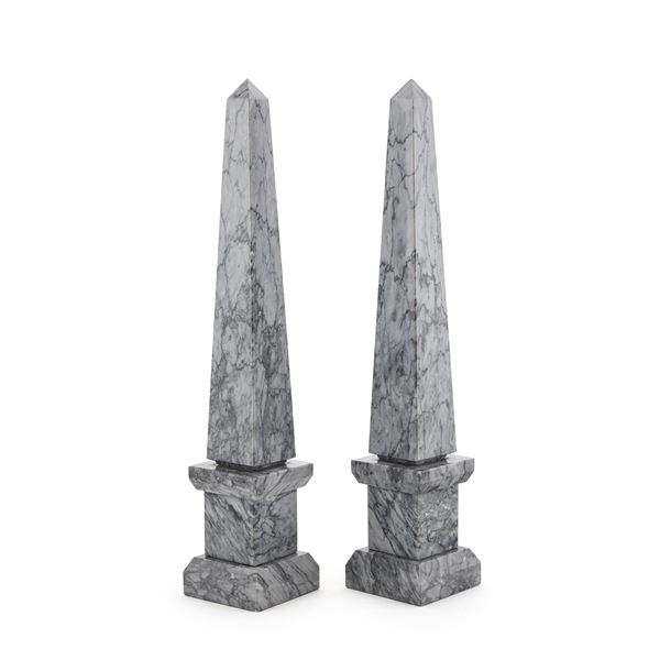 Pair of gray marble obelisks