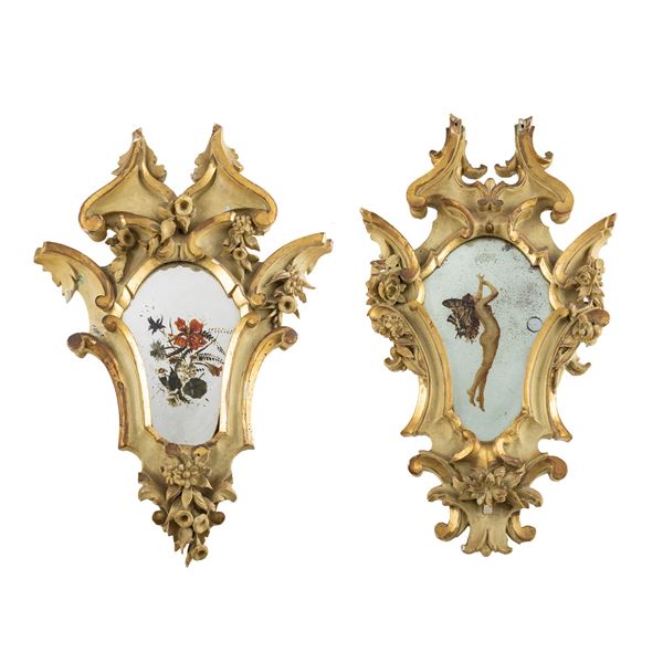 Pair of lacquered and gilded wood mirrors