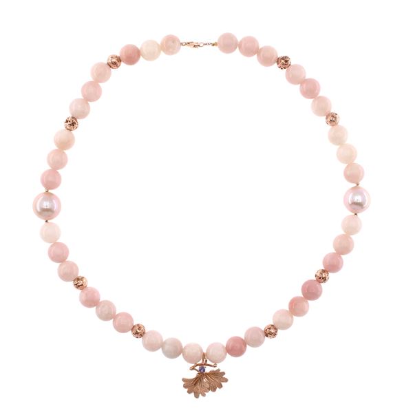 Necklace with a strand of pink opal alternating with hematite and two pearls