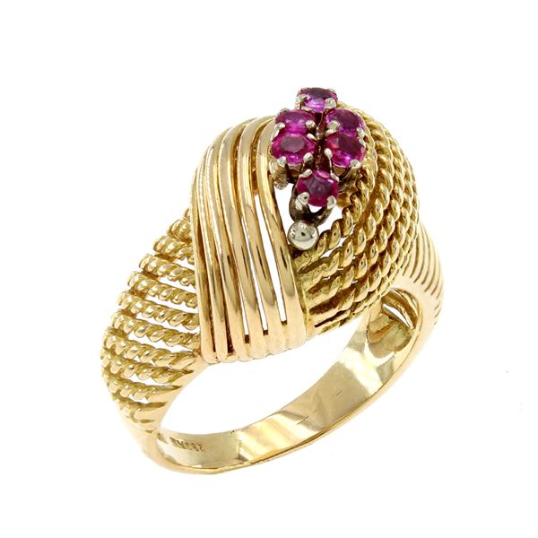 Anello in oro giallo 18kt e rubini tondi