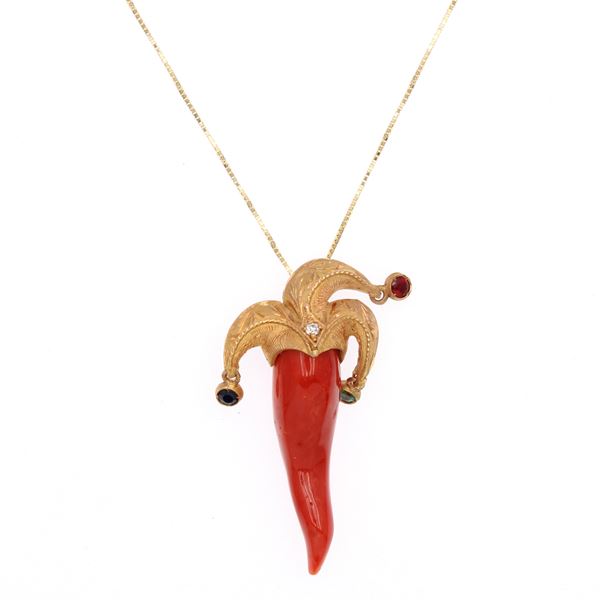 Coral horn pendant set in 14kt rose gold with one diamond