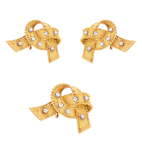 Spilla e orecchini in oro giallo e bianco 18kt con diamanti