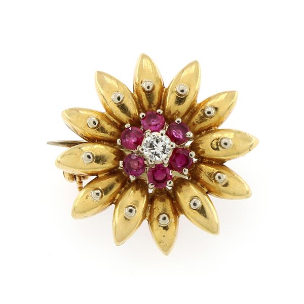 18kt yellow gold flower brooch with brilliant cut diamonds and rubies
