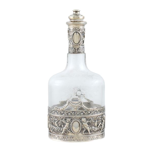 Silver and cut glass bottle