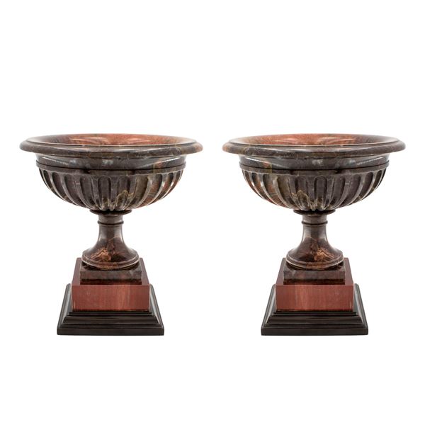 Pair of African marble stands