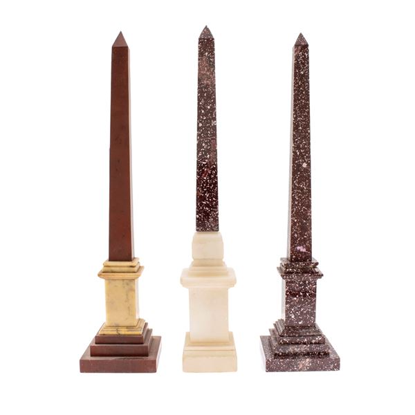Three models of obelisks in various marbles