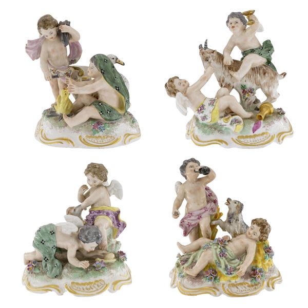Four polychrome porcelain groups