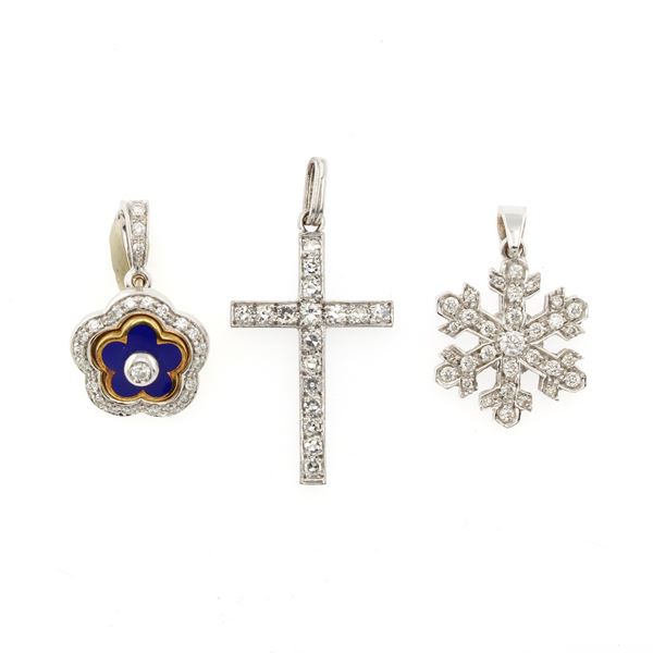Three 18kt white and yellow gold and diamonds pendants