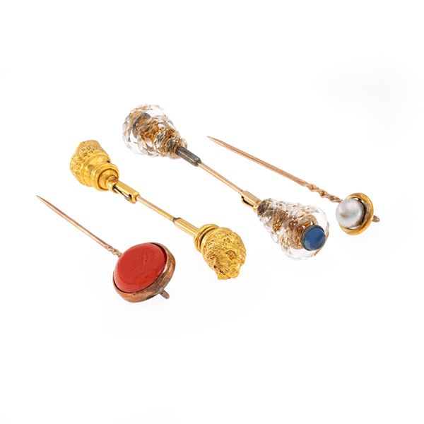 Two jabot pins and two yellow 18kt gold pins