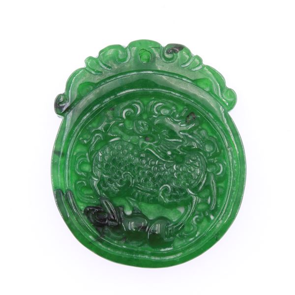 Jade pendant carved and engraved to depict a dragon