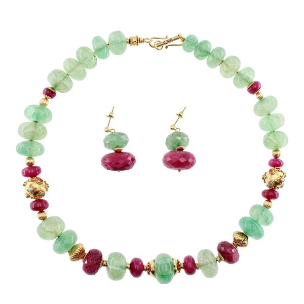 18kt yellow gold and ruby root en suite pendant necklace and earrings