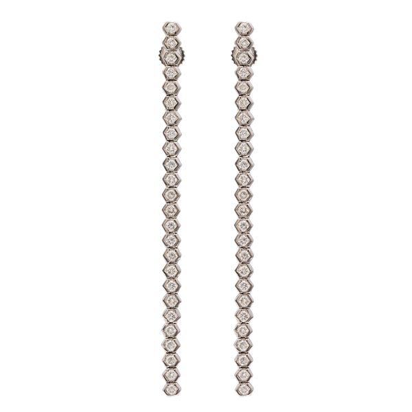 18kt white gold and diamonds tennis earrings