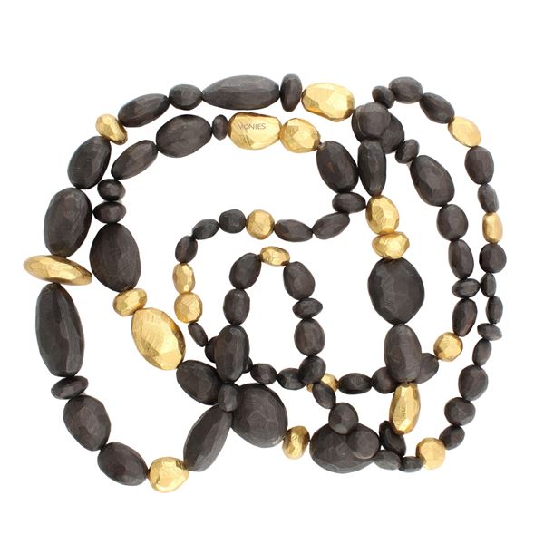 Monies lunga collana in ebano sfaccettato