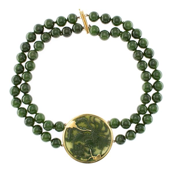 Two-strands of nephrite jade necklace with central pendant