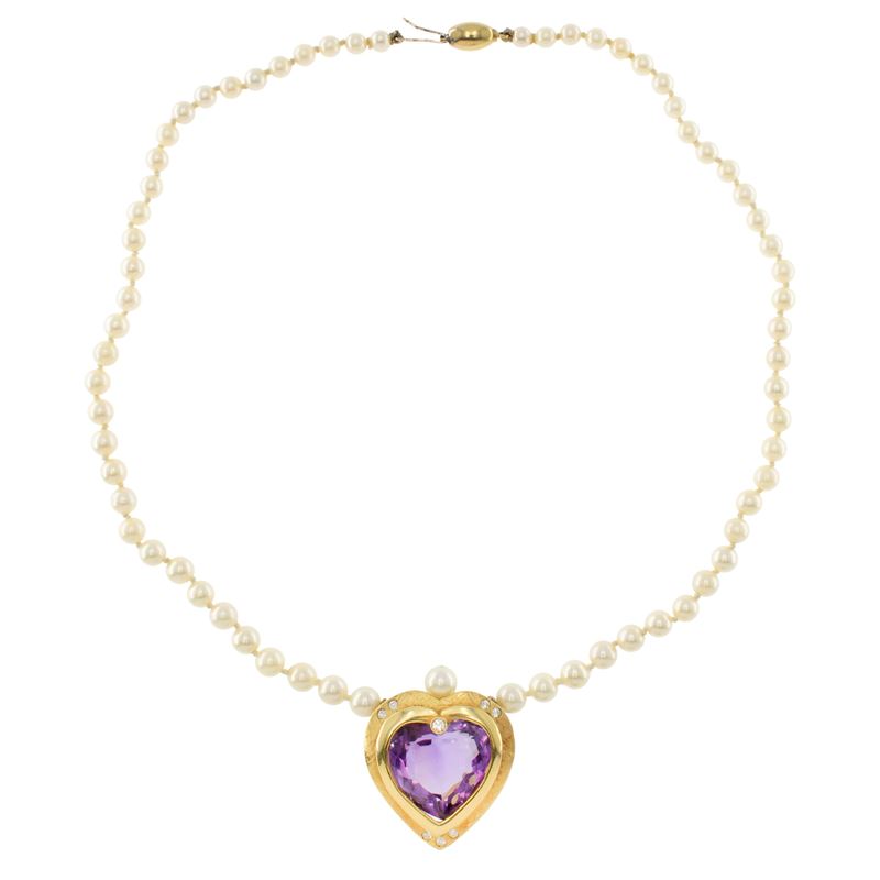 Collana in oro giallo 18kt con pendente a cuore in ametista e diamanti