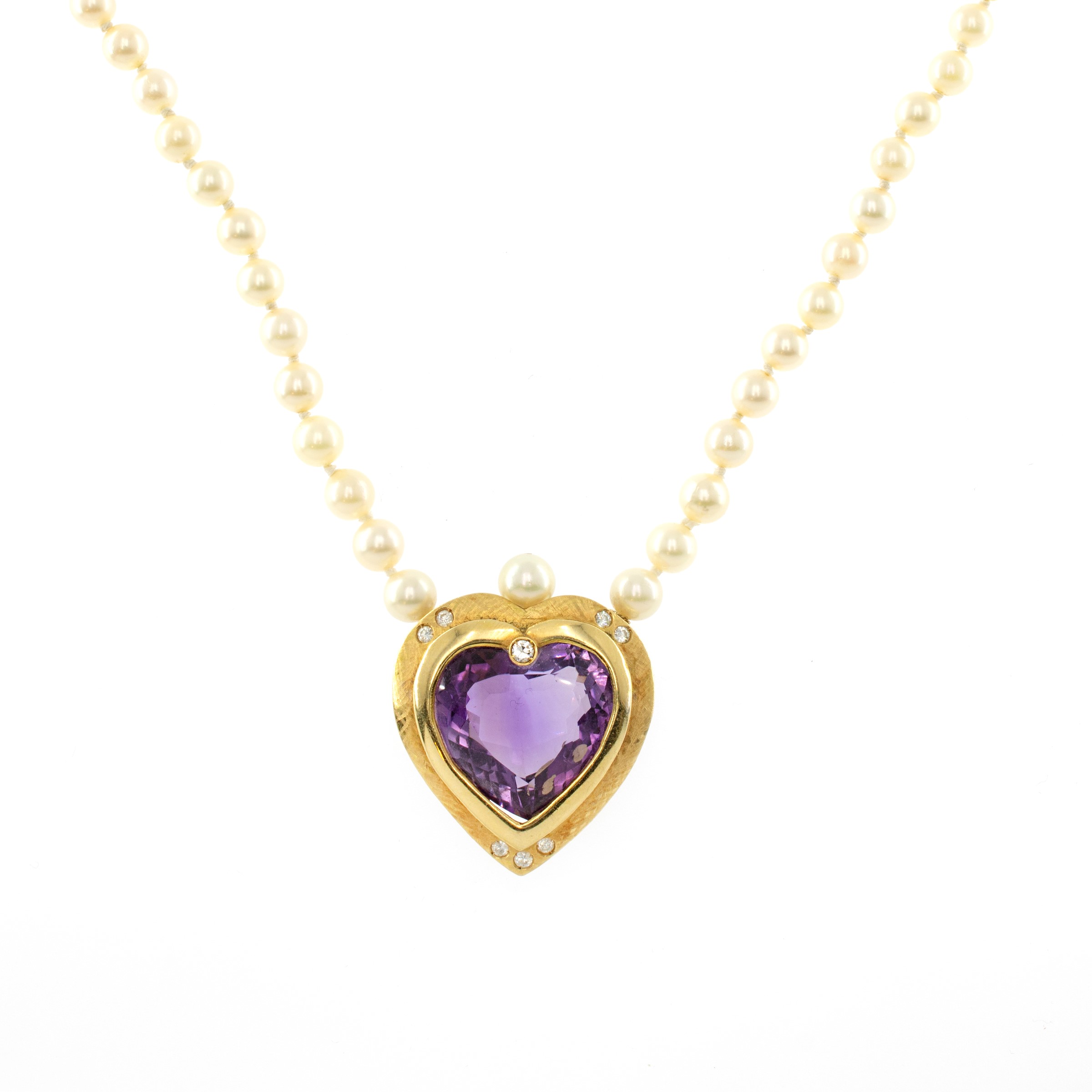 Collana in oro giallo 18kt con pendente a cuore in ametista e diamanti