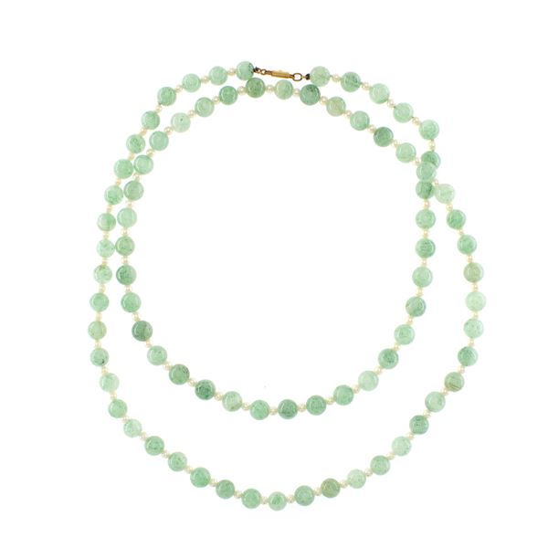 Long necklace with a string of amazonite spheres and small pearls