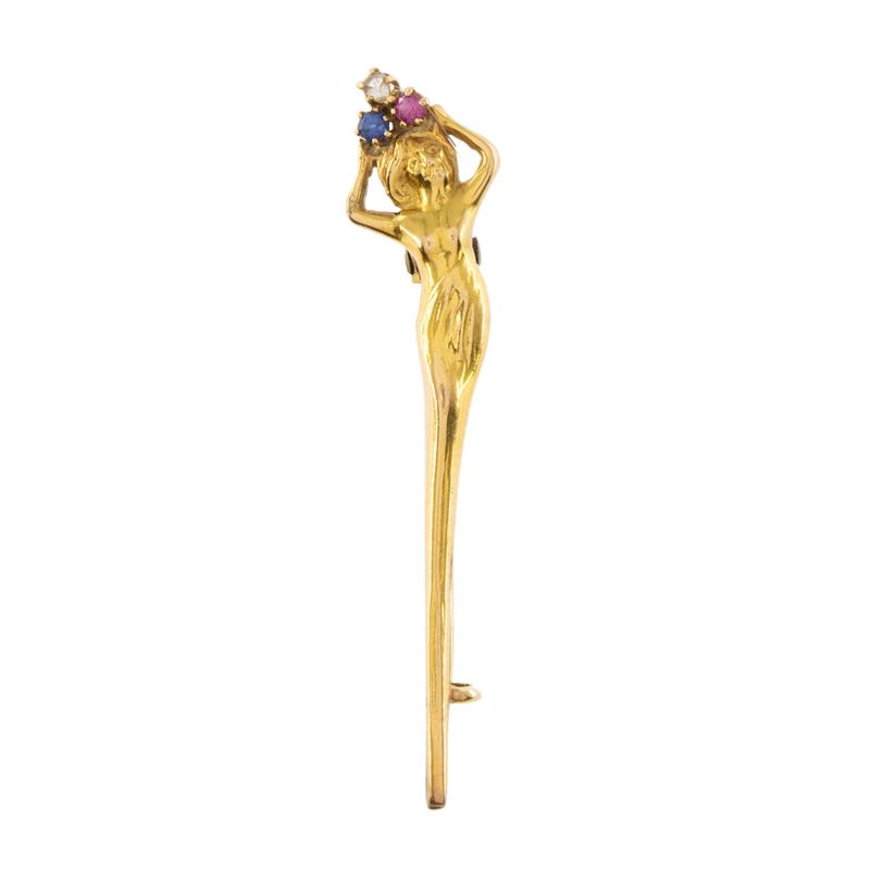 Spillone Liberty, nudo di donna, oro giallo 18kt con rubino e zaffiro
