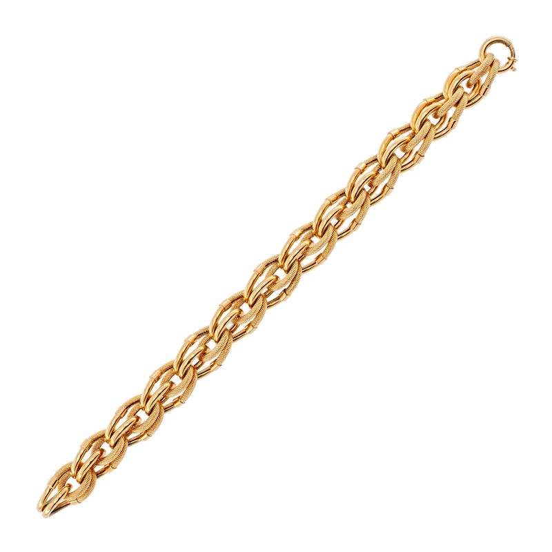 Bracciale a maglie intrecciate, oro giallo 18 kt, anni '50/'60