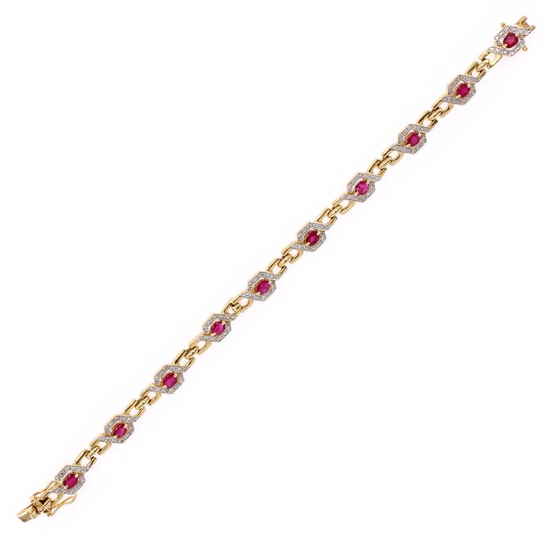 Bracciale in oro giallo e bianco 18 kt con rubini e diamanti, lunghezza 18 cm
