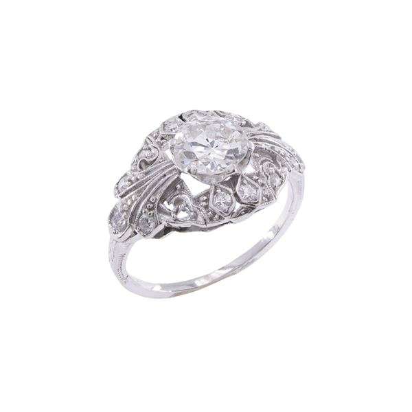 Antique 18kt white gold ring with one diamond