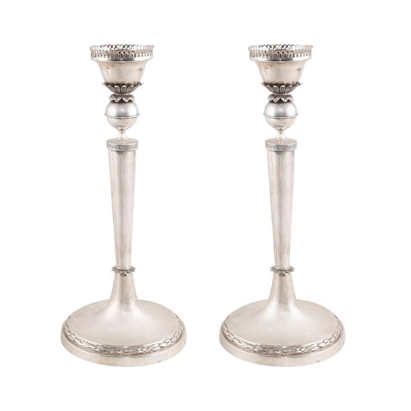 Pair of silver candlesticks