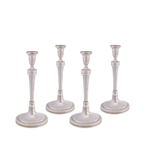 Set of 4 silver candlesticks